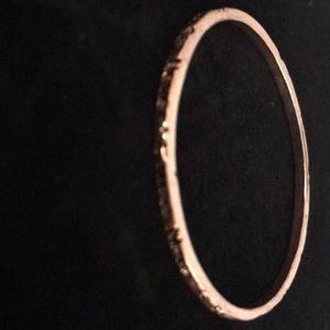 Perfect condition!  Rose gold bracelet! Says "Never say never"